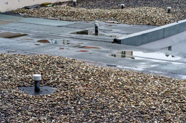 Tar And Gravel Roof Repair in Owasso