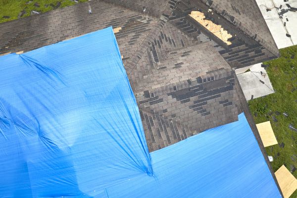 Storm Damage Roof Tarping in Owasso